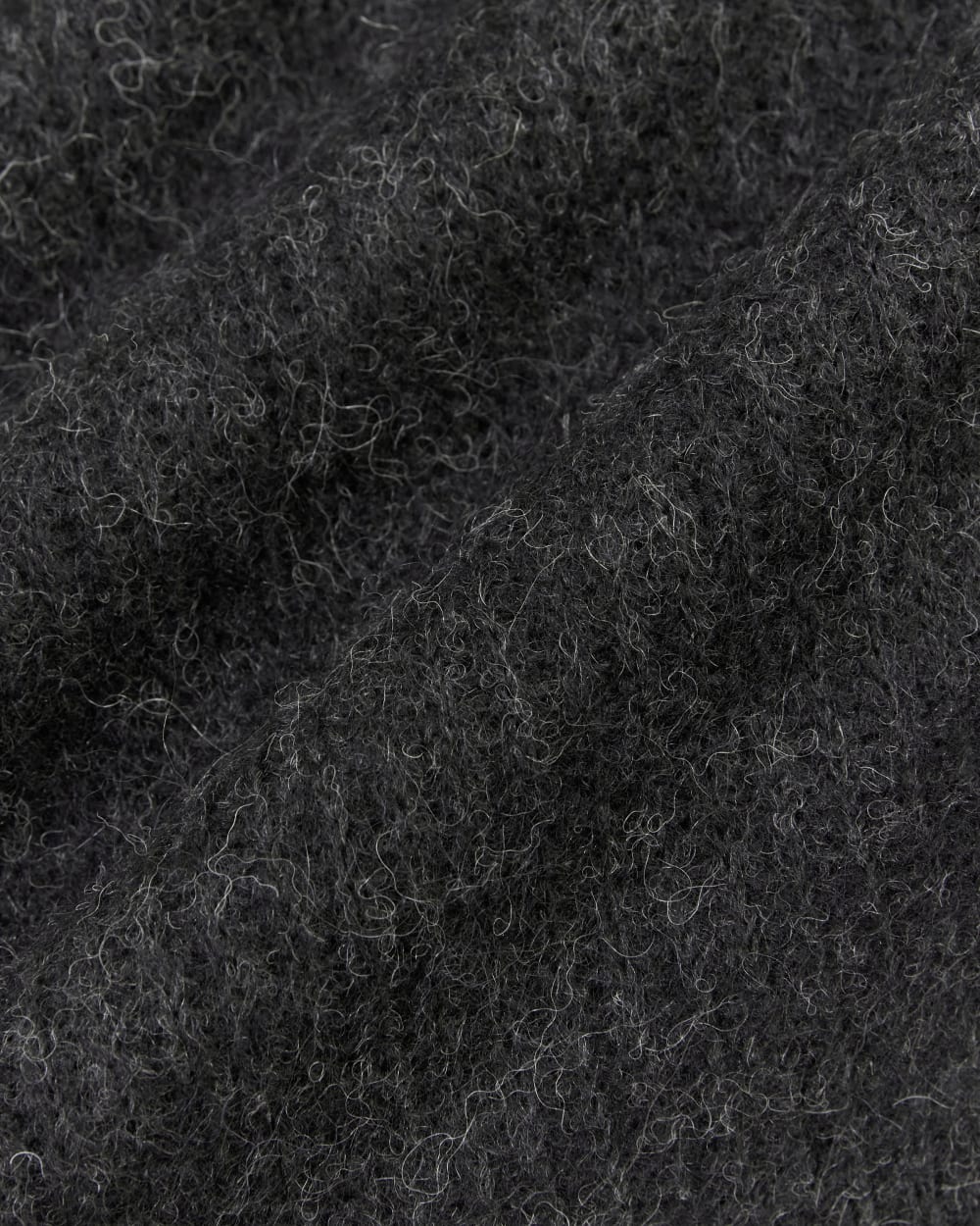 The Oversized Polo in Alpaca in Heathered Black — detail view