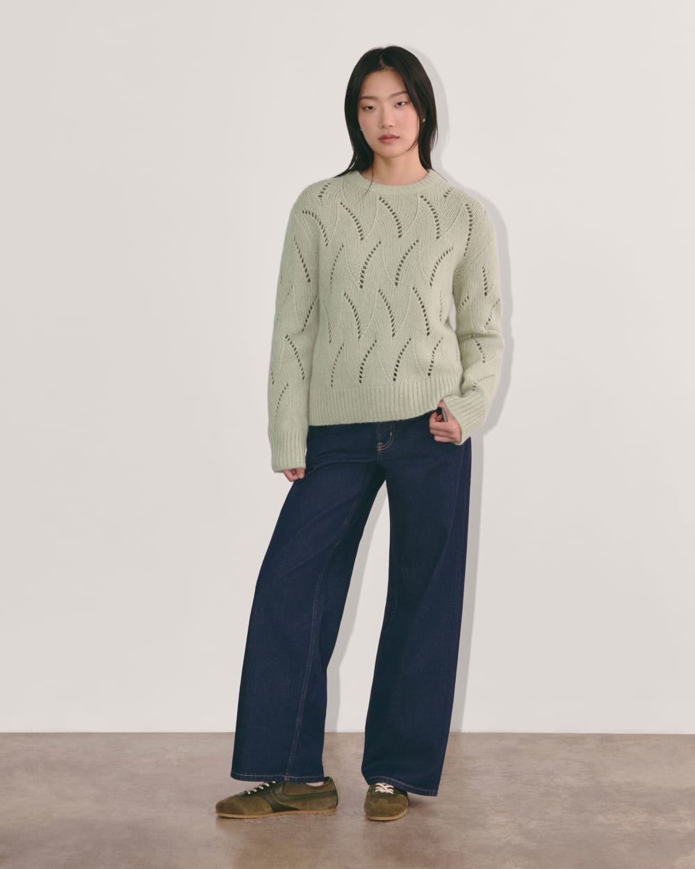 The Pointelle Sweater in Cloud in Seagrass — detail view
