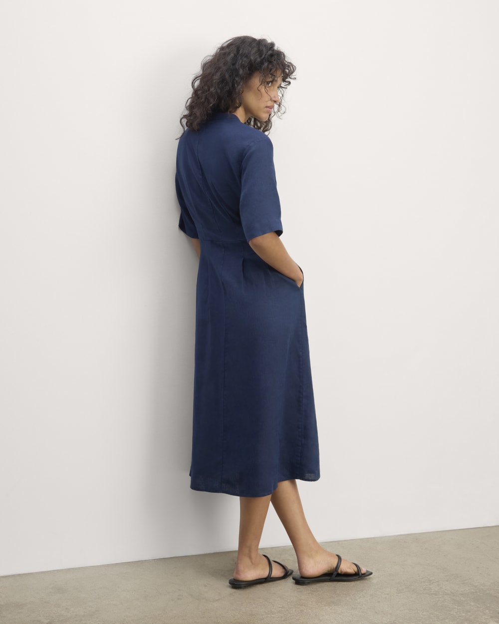 The Frolic Dress in Linen in Navy — detail view