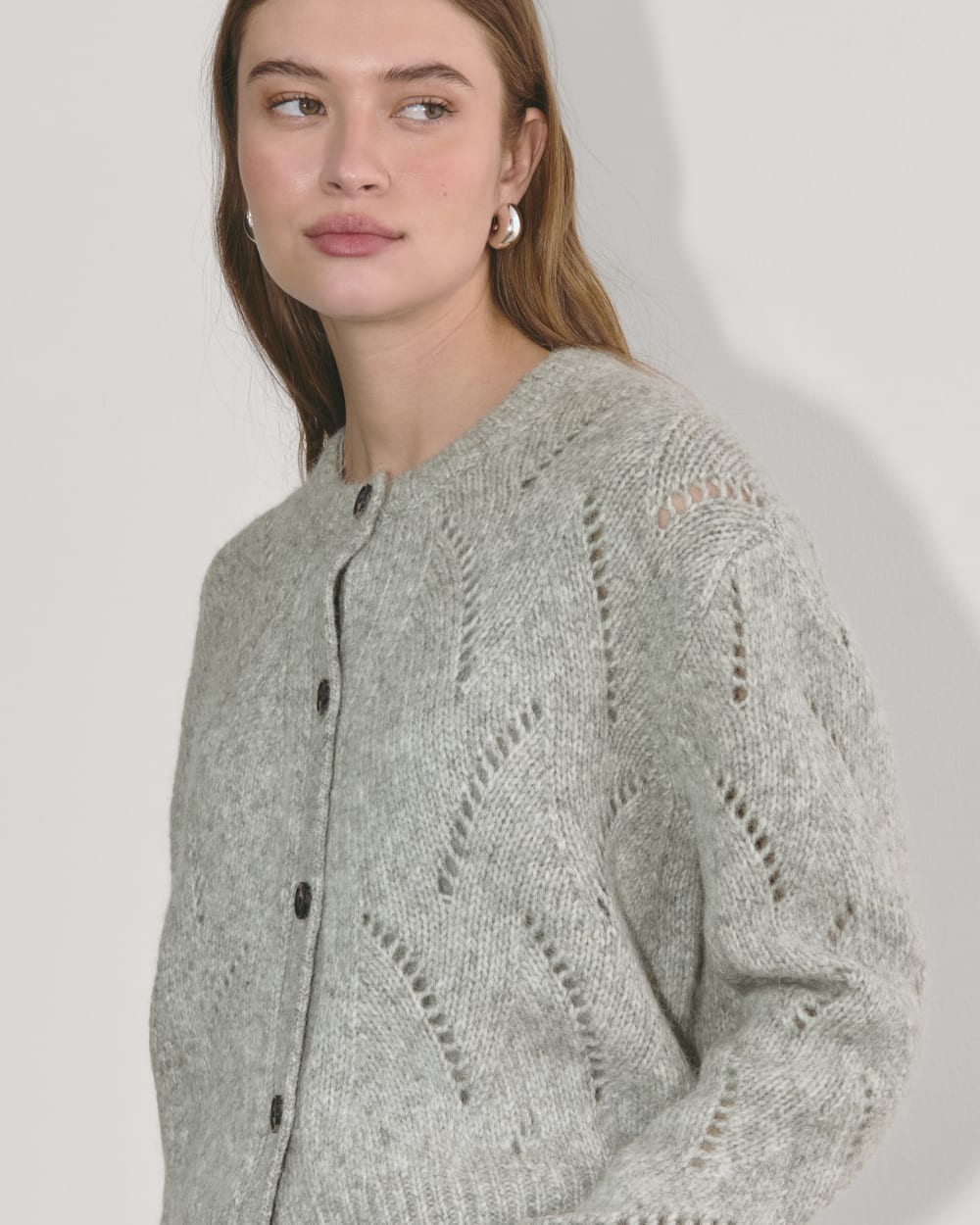 The Pointelle Cardigan in Cloud in Heather Grey — detail view
