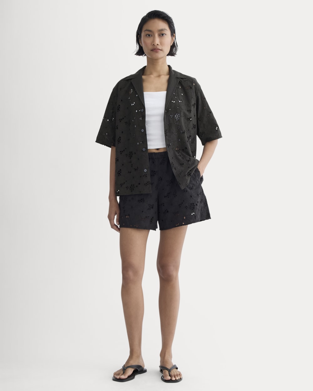The Eyelet Pull-On Short in Black — front view
