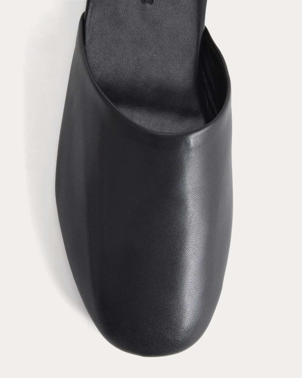 Glove Mule Slipper in Black Leather — detail view