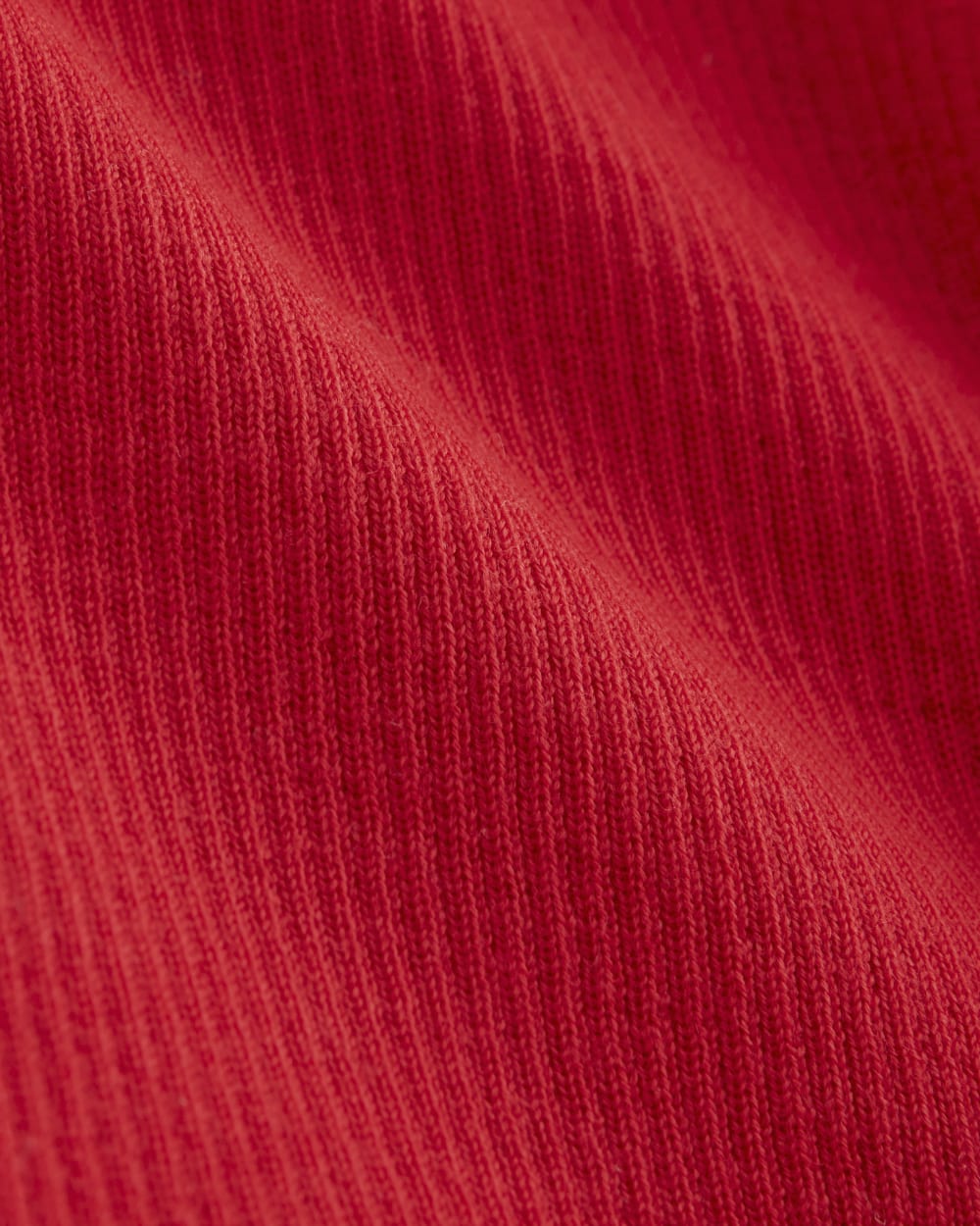 The Cardigan in Ultrasoft Merino in Classic Red — detail view