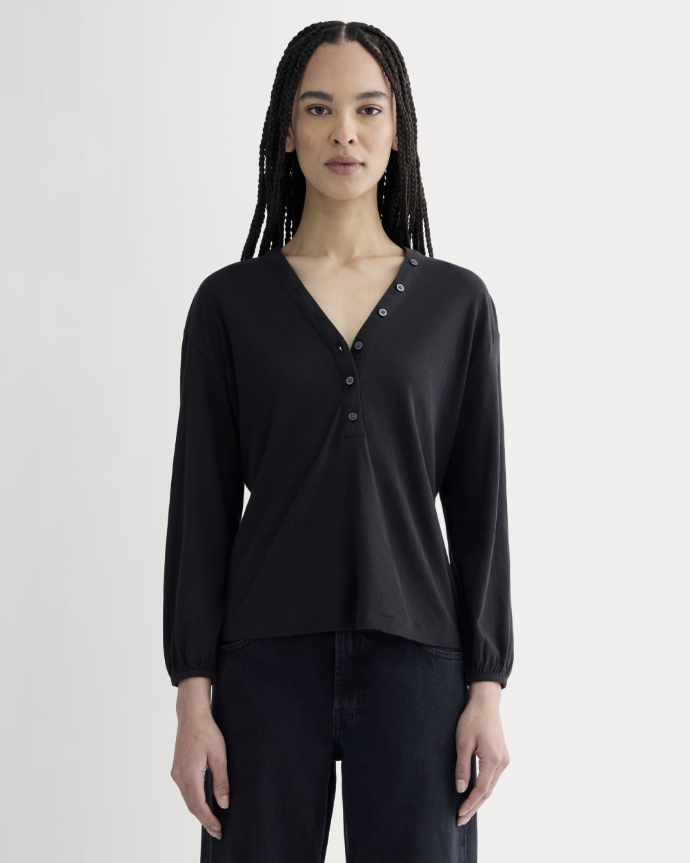 The Air V-Neck Henley in Black — front view