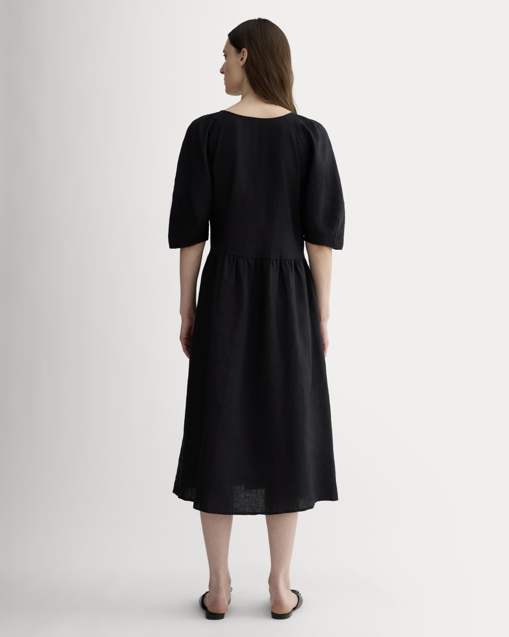 The Linen Oversized Puff-Sleeve Dress in Black — detail view