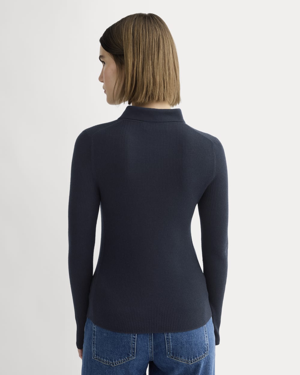 The Polo in Ultrasoft Merino in Navy — detail view