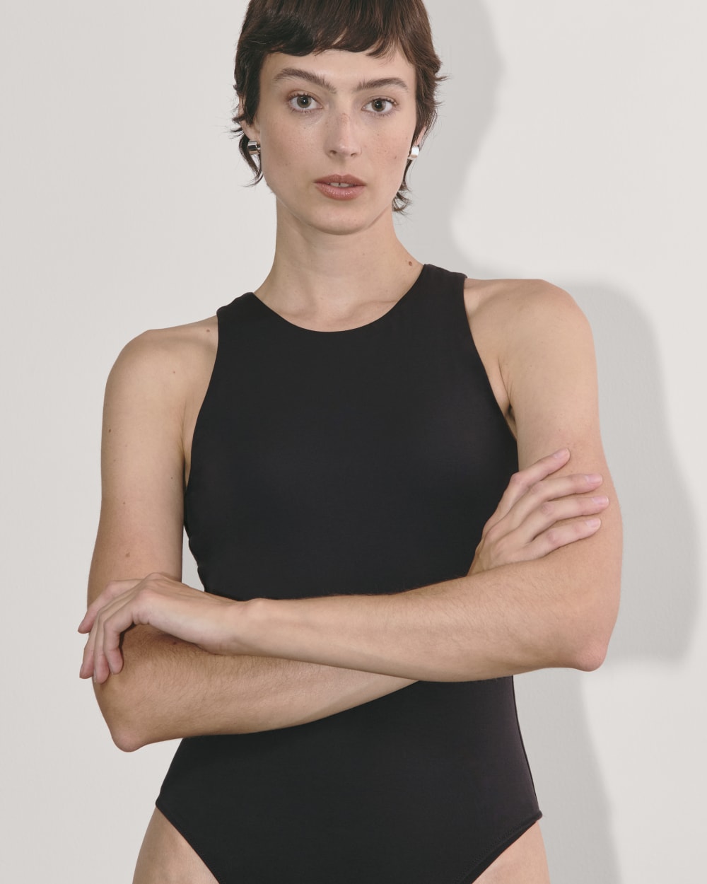 The Cutaway Tank Bodysuit in Black — detail view