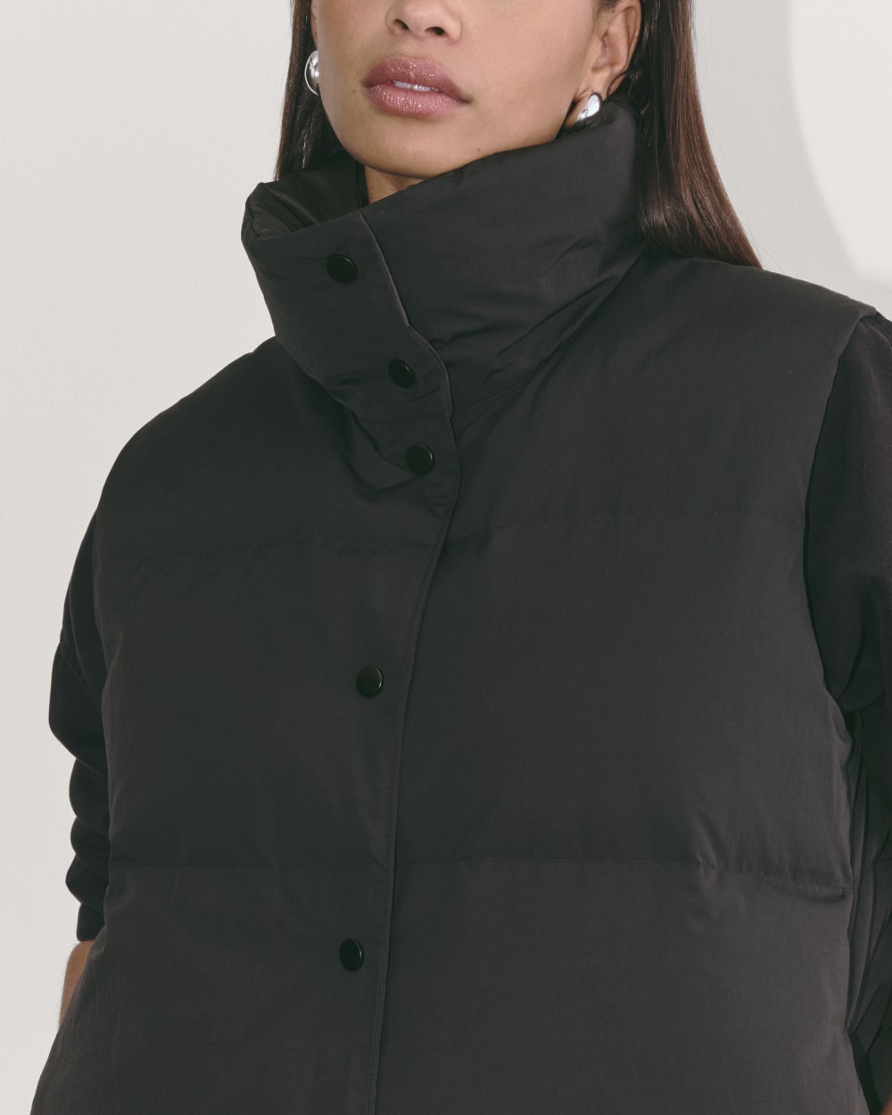 The Puffer Vest in Black — detail view