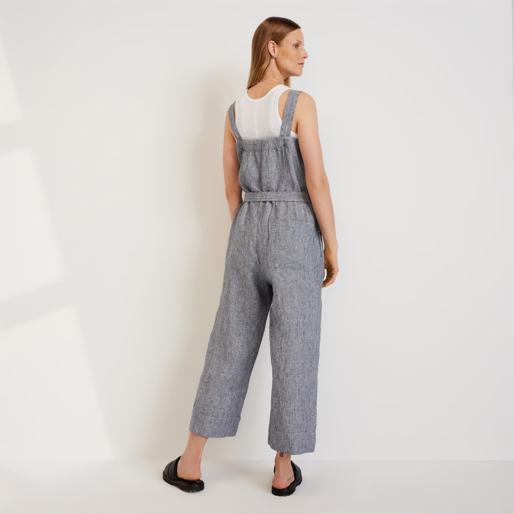 The Linen Jumpsuit in Canvas Tan / Navy — detail view