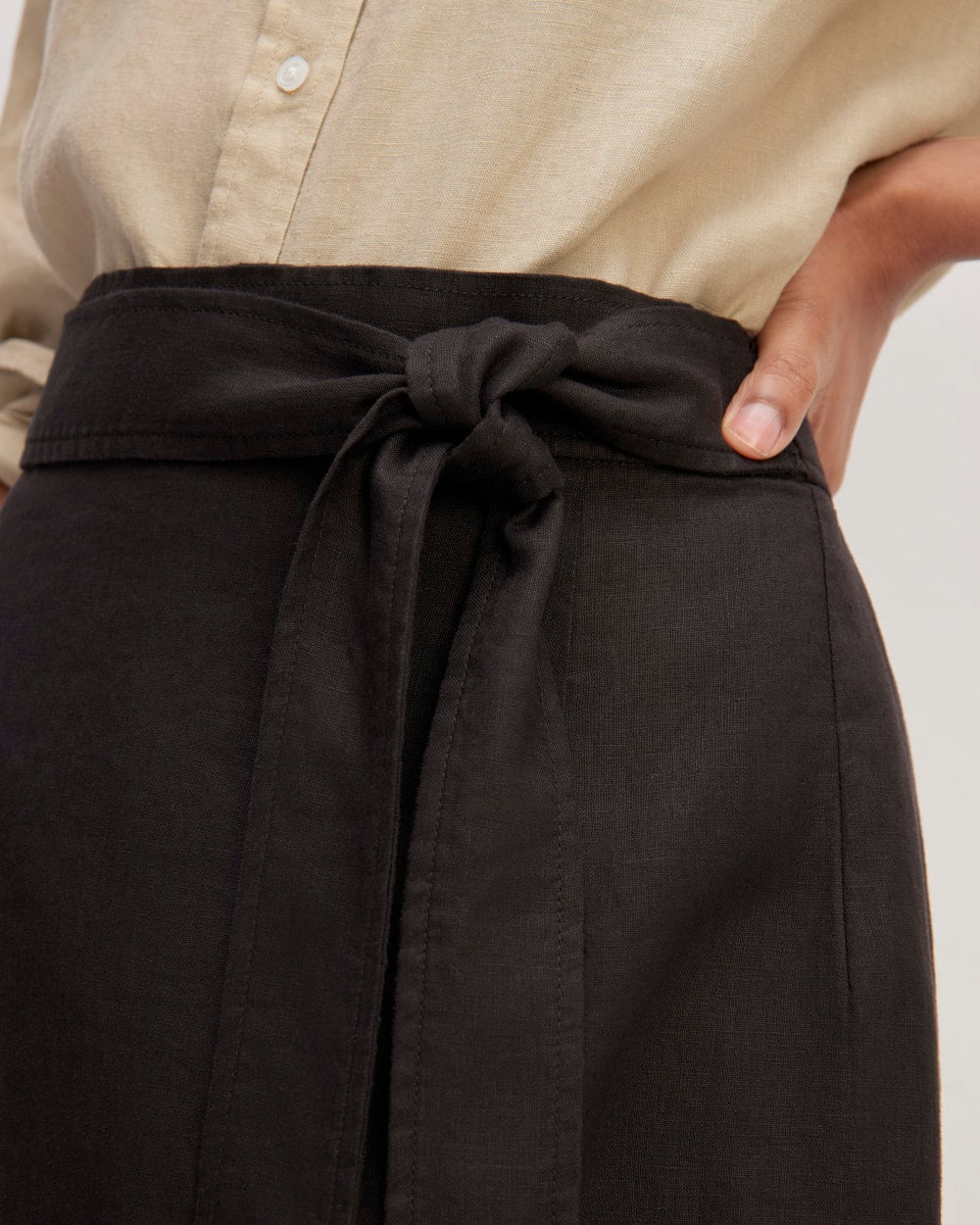 The Linen Wrap Skirt in Black — detail view