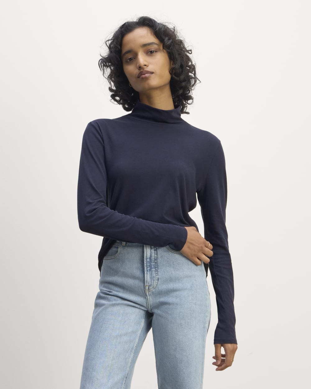 The Air Turtleneck in Navy — front view