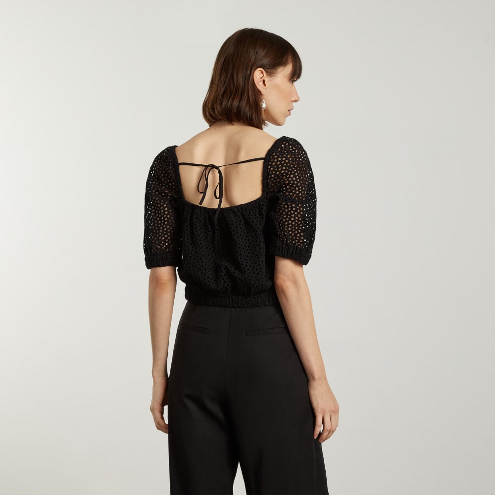 The Eyelet Puff Sleeve Top in Black — detail view