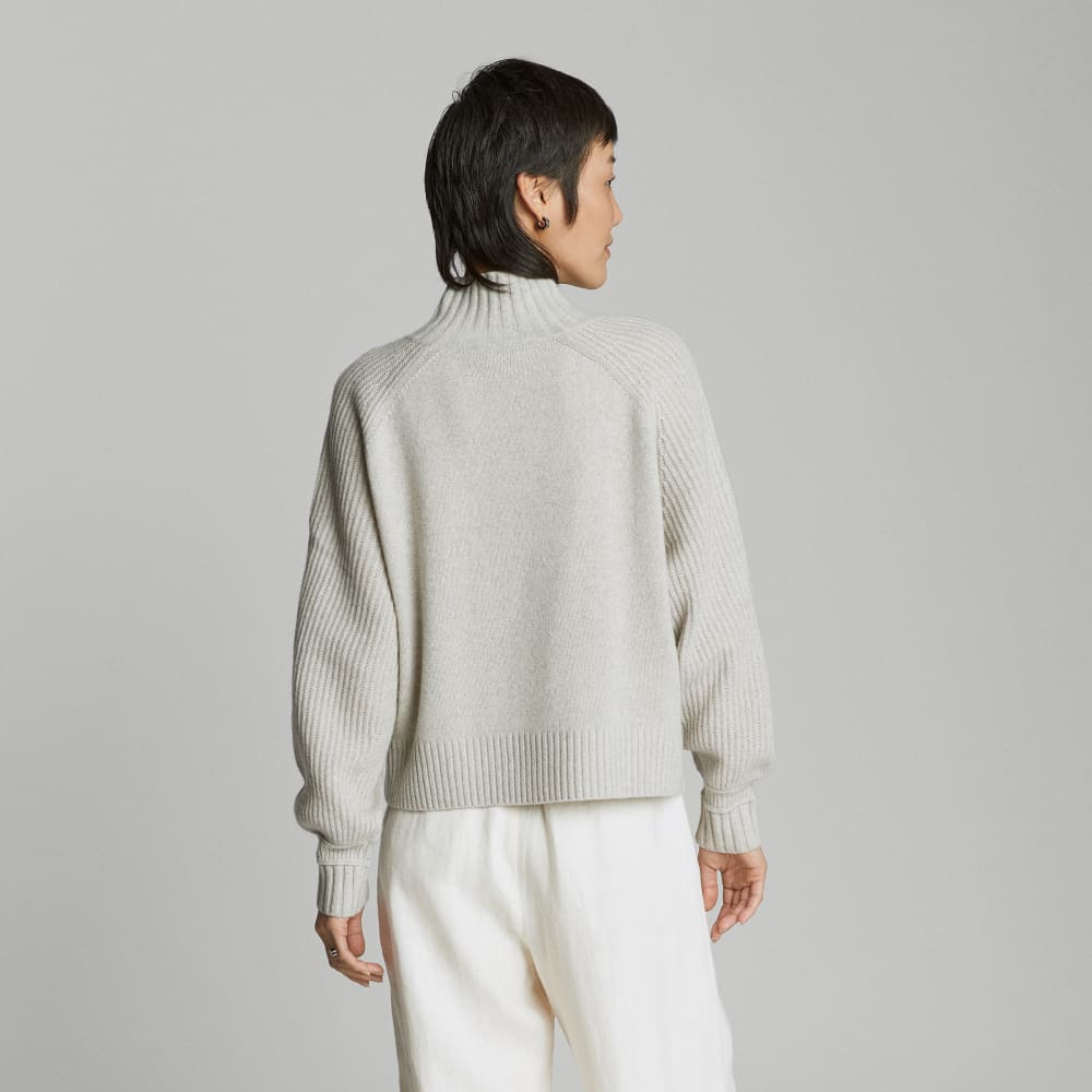 The Cashmere Ribbed Turtleneck in Pale Heathered Grey — detail view