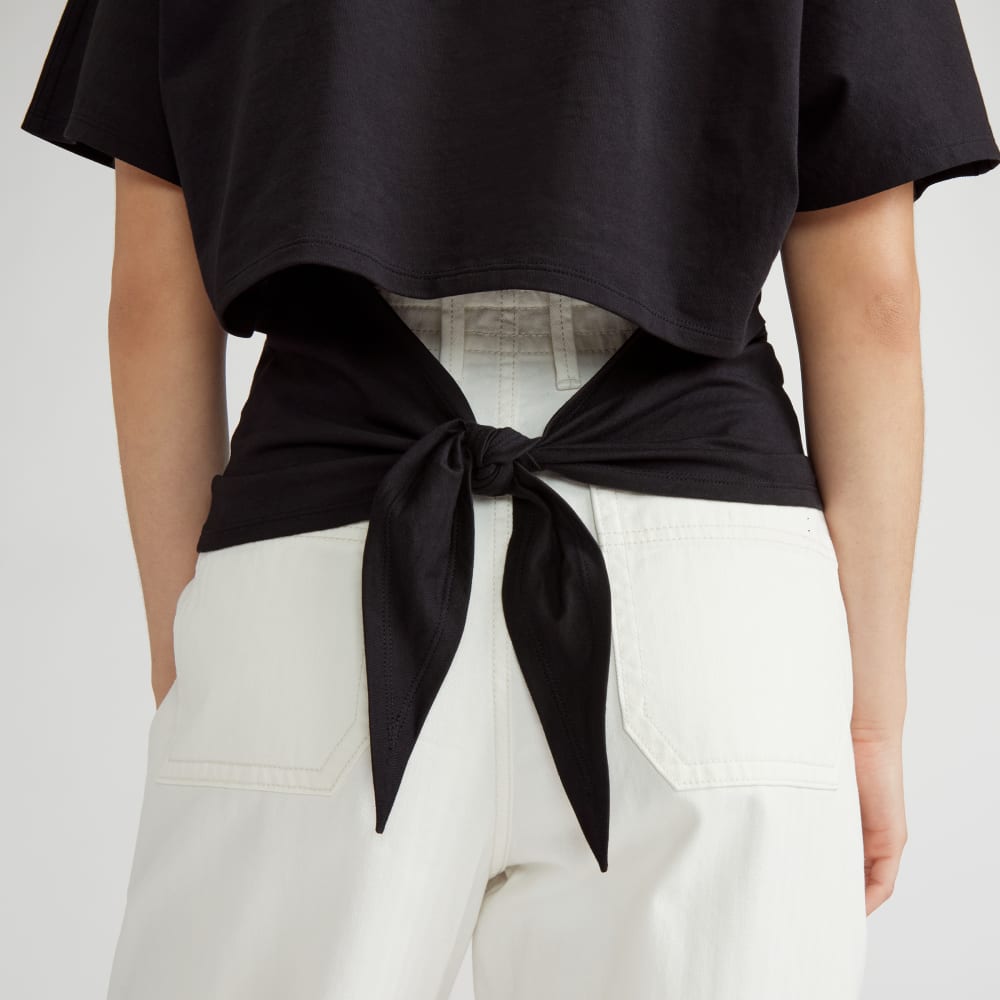 The Organic Cotton Tie Back Tee in Black — detail view