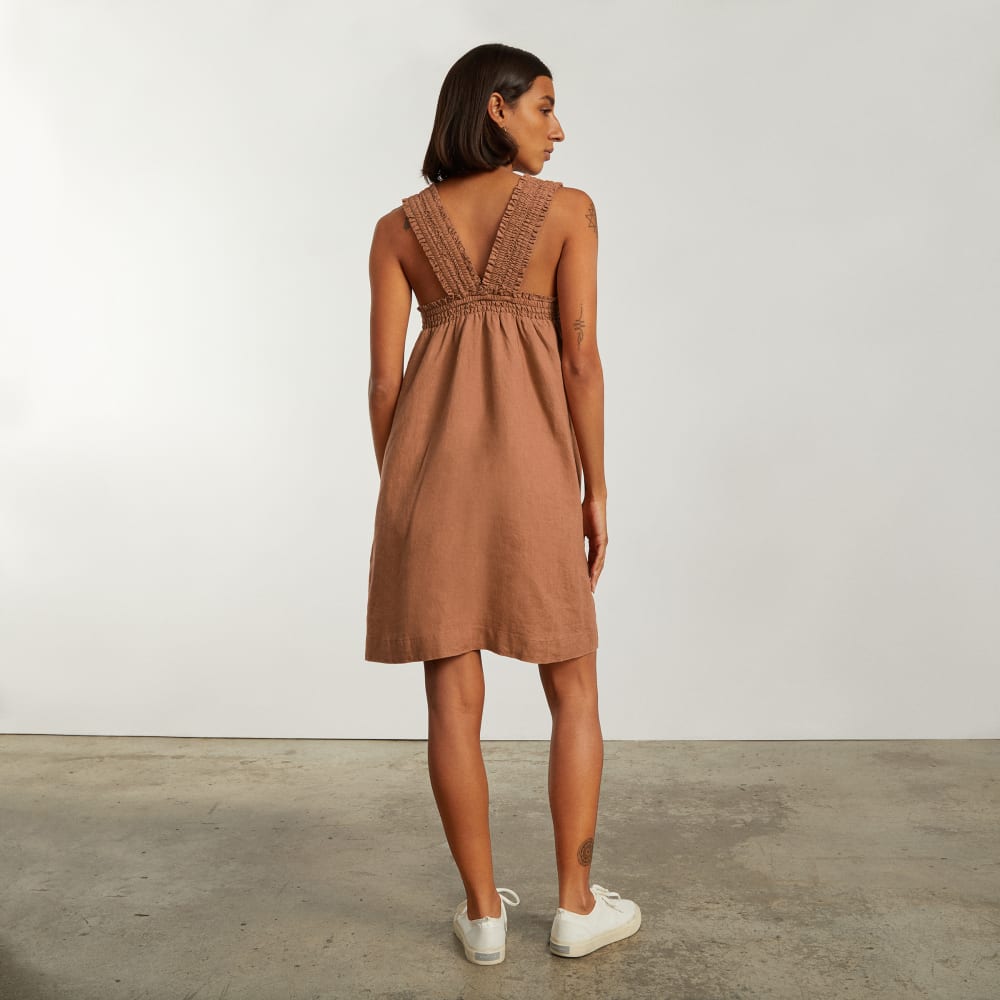 The Smocked Linen Dress in Tawny Brown — detail view