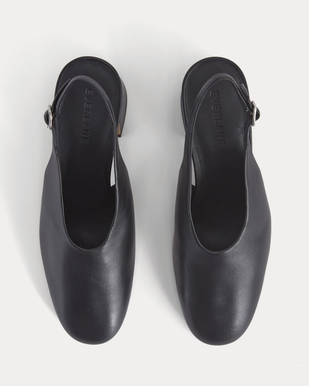 Curved Slingback Heel in Black — detail view