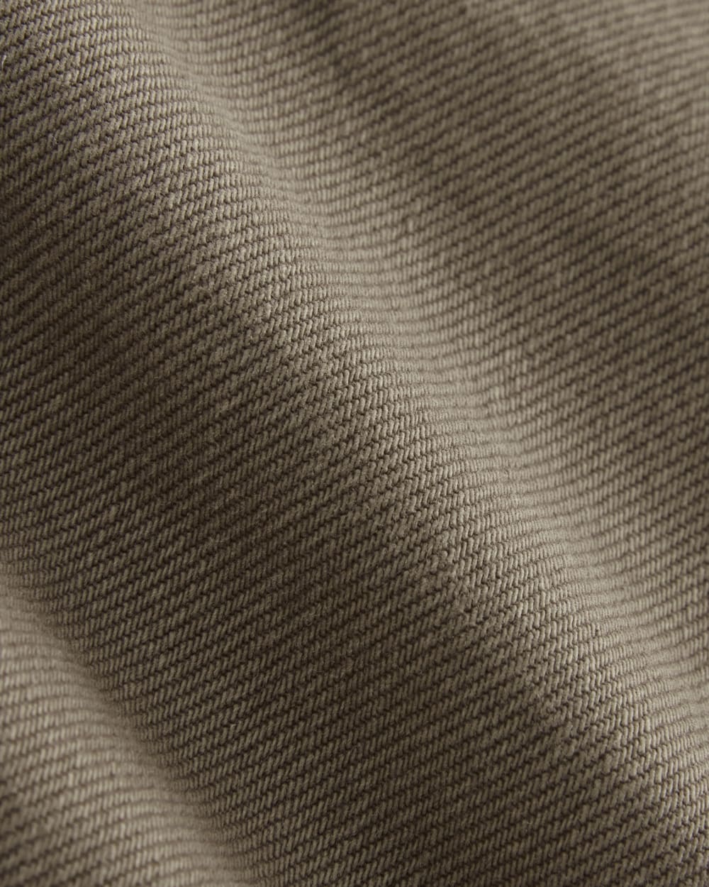 The A-Line Denim Short in Garment-Dyed Chocolate — detail view