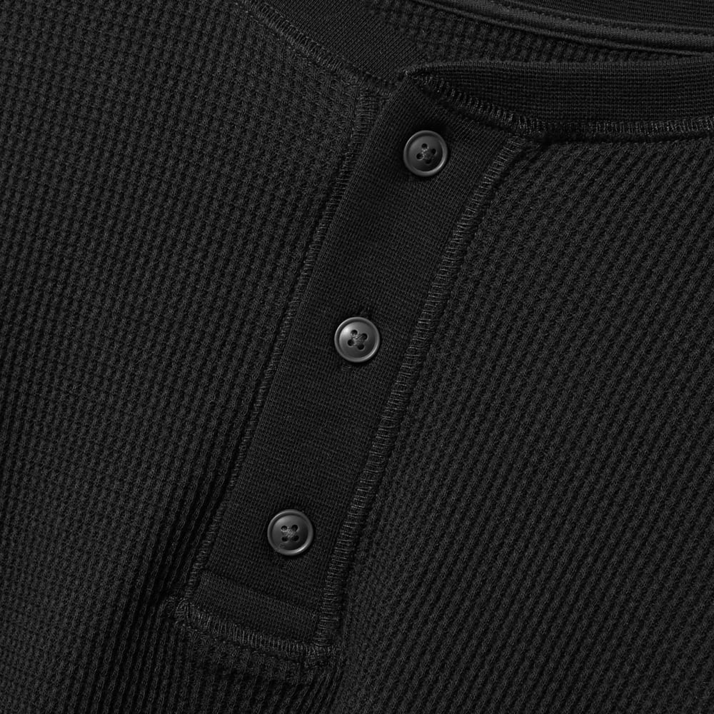 The Organic Cotton Waffle Henley in Black — detail view