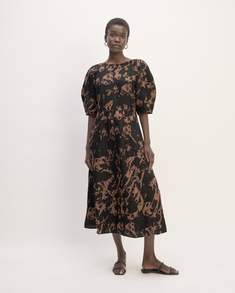 The Linen Short-Sleeve Scoop Midi Dress in Carob Brown Abstract — front view