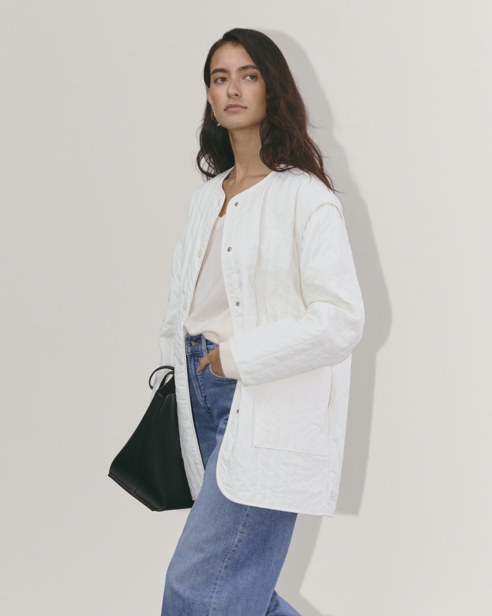 The Midi Quilted Liner in Bone — detail view