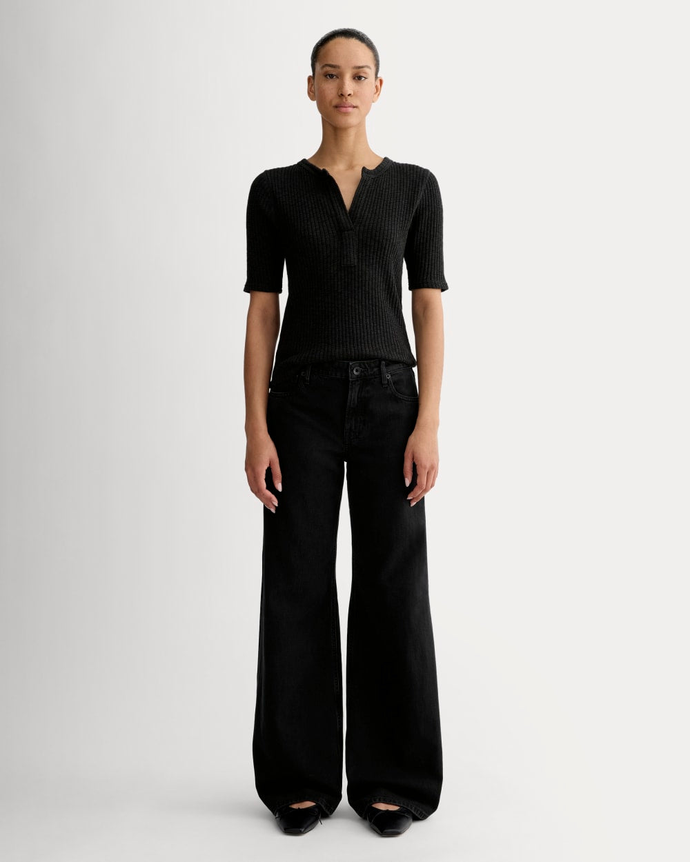 The Rib-Knit Short-Sleeve Henley in Black — detail view