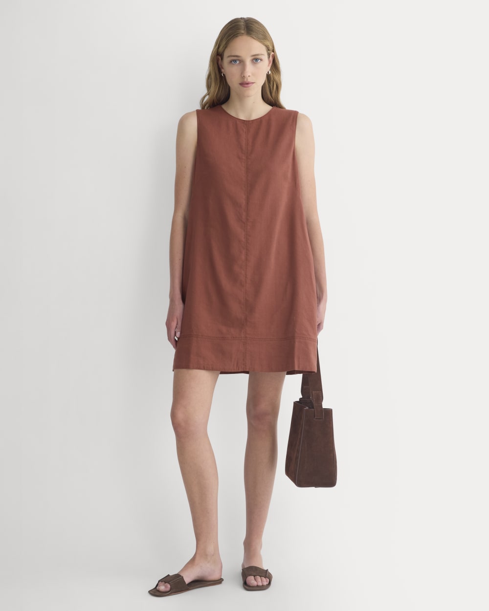 The Shift Dress in Stretch Linen in Henna Red — front view