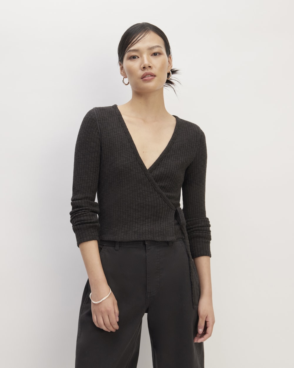 The Cozy Rib Wrap Top in Black — front view