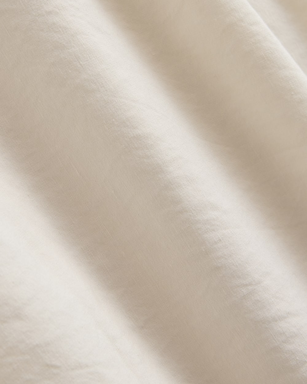 Strapless Dress in Stretch Linen in Bone — detail view