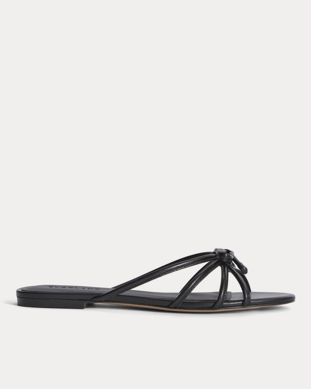 The Bow Sandal in Black — front view