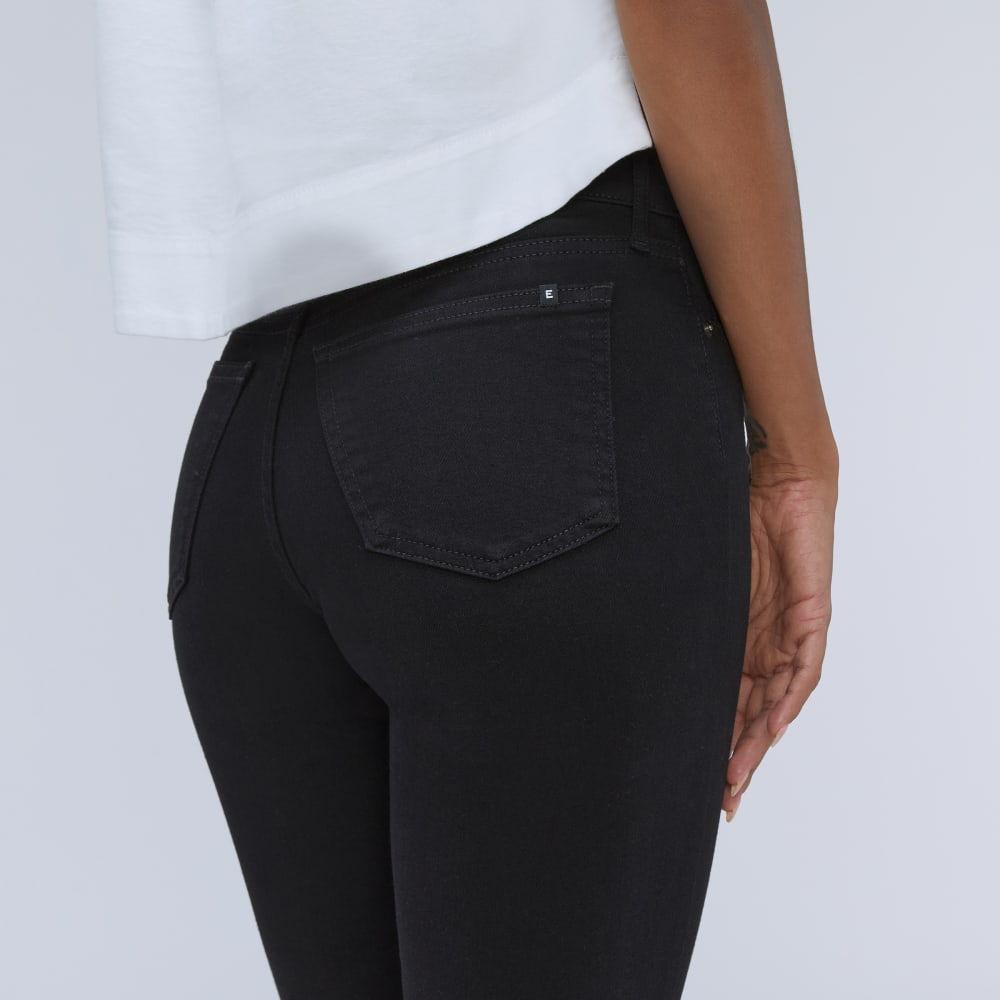 The Mid-Rise Skinny Stretch Jean in Black — detail view