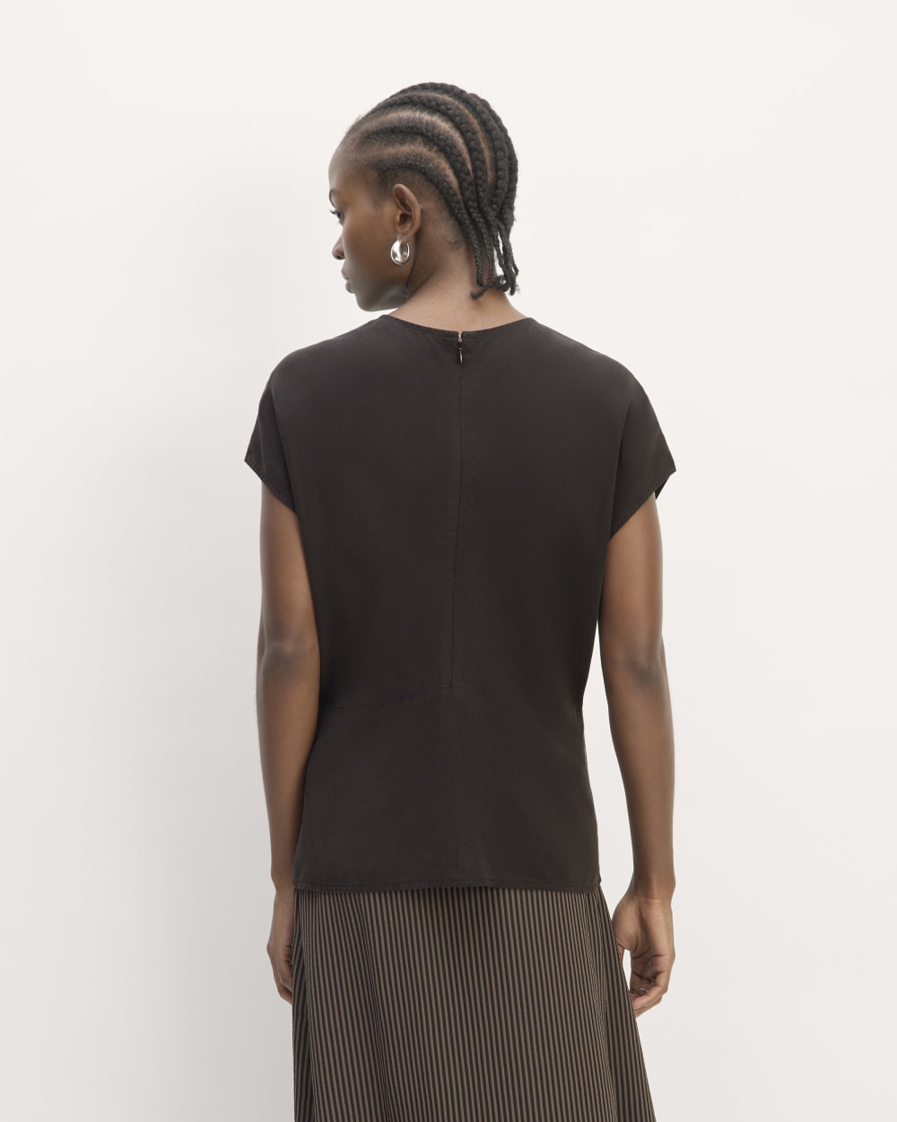 The Drape Top in Butterlite in Black — detail view