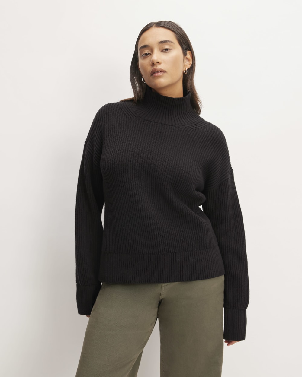 The Organic Cotton Ribbed Turtleneck in Black — front view