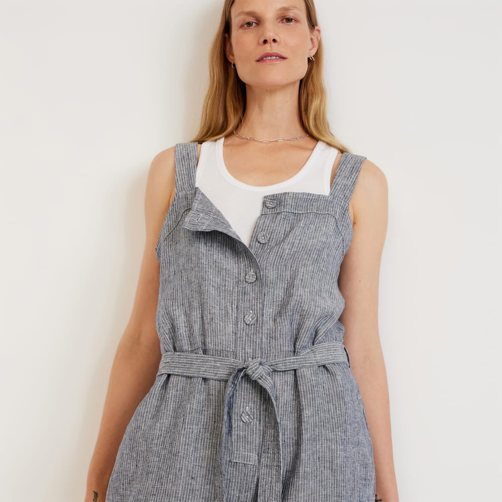 The Linen Jumpsuit in Canvas Tan / Navy — detail view