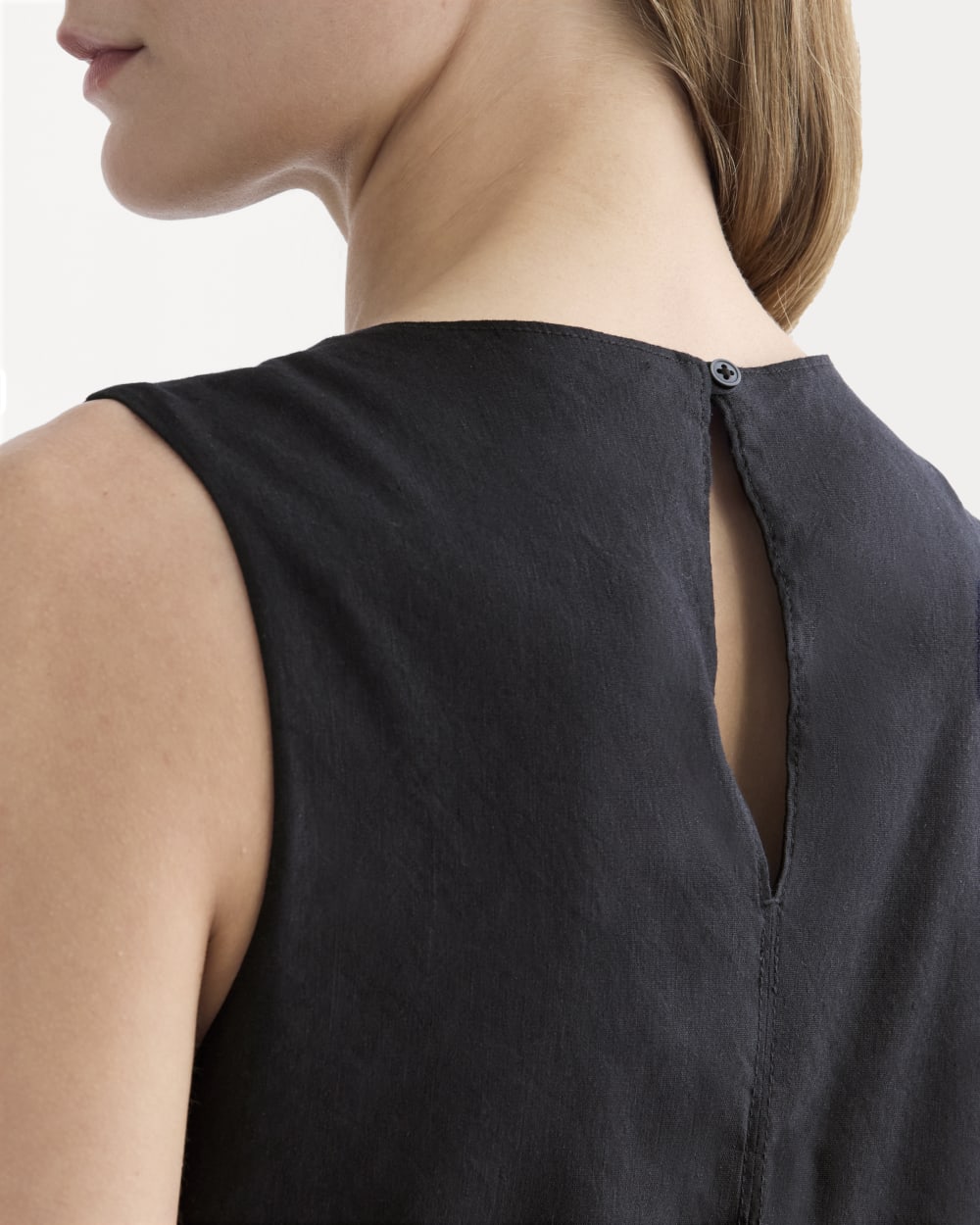 The Shift Dress in Stretch Linen in Black — detail view