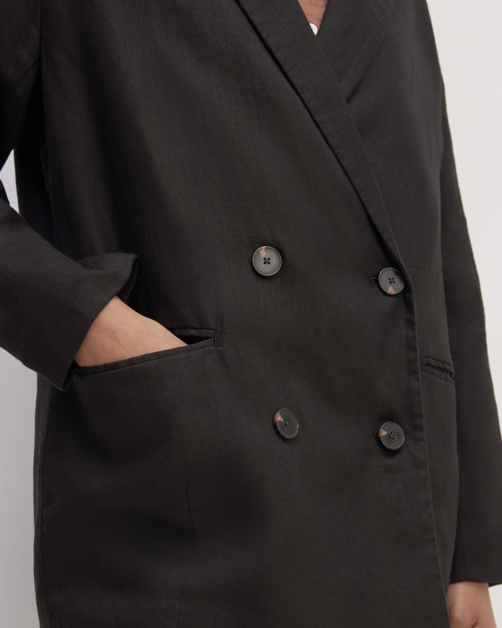 The Linen Double Breasted Blazer in Black — detail view