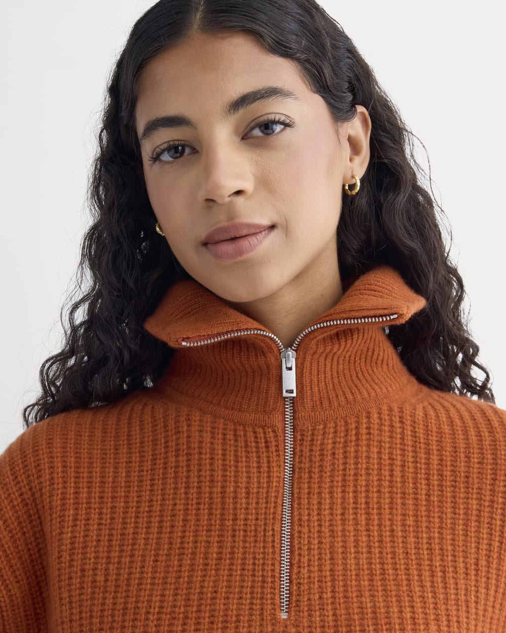 The Half-Zip Sweater in Luxe Merino in Rust Heather — detail view