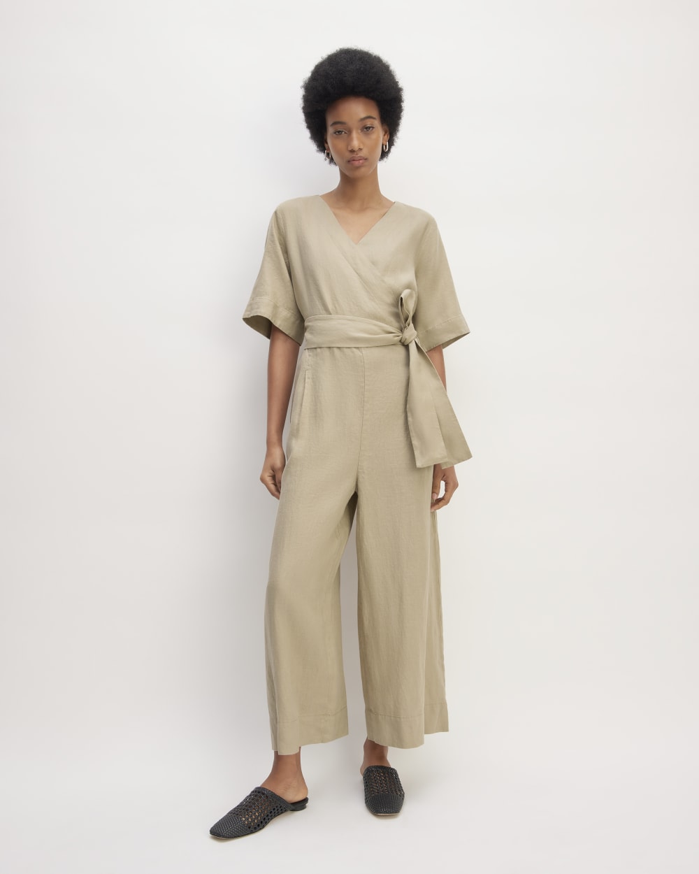 The Wrap Jumpsuit in Linen in Trench Coat Khaki — front view