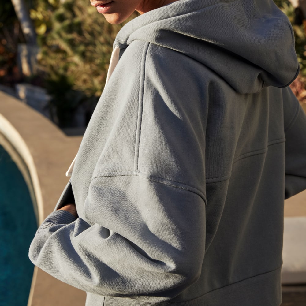 The Track Organic Cotton Hoodie in Faded Blue — detail view