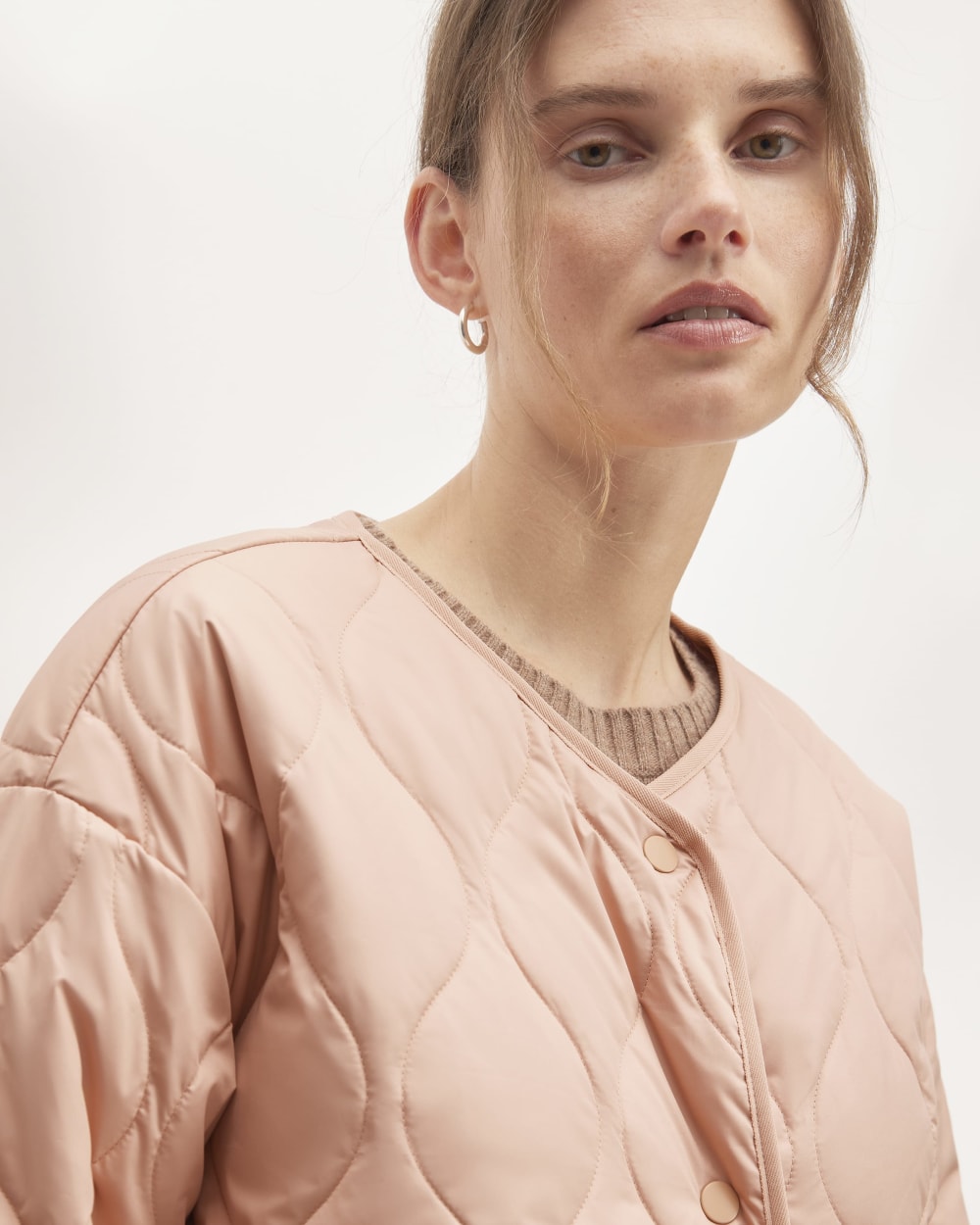 The Quilted Liner in Blush Pink — detail view